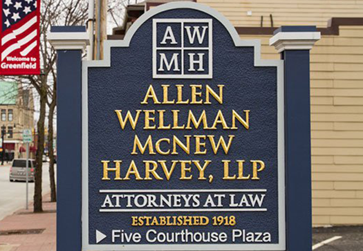 Photo of the name board of Allen Wellman Harvey Keyes Cooley, LLP | Attorneys At Law, office building